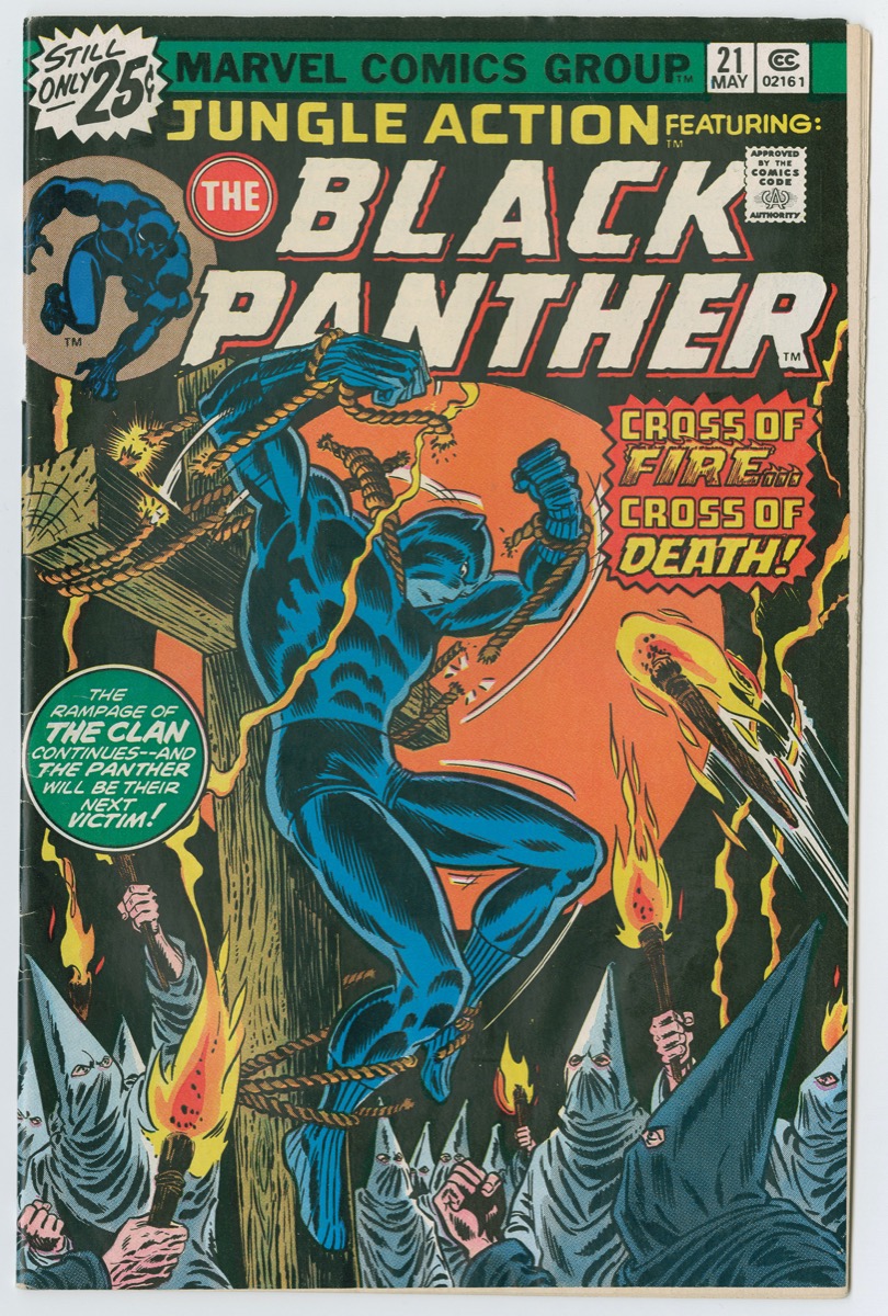 Comic book cover with title along the top, with the words cross of fire cross of death, in a red box below. The drawing shows Black Panther breaking ropes holding him to a wood beam cross at his wrists, neck and feet. Men in white pointed hoods holding flaming torches stand below and look up at him.