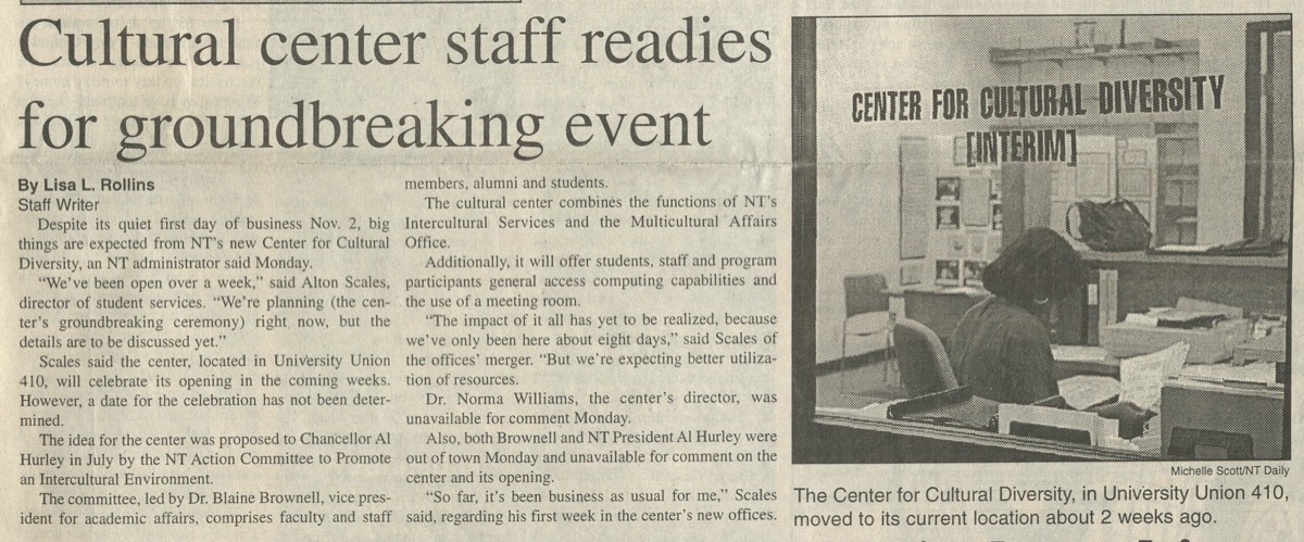 News article with the title at the top. Under it are two columns of text. On the top right is a photo of a woman at a desk.