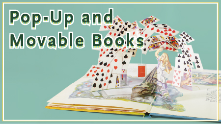 Light blue background with text designed to look like it's popping up, that reads Pop-Up and Movable Books. An image on the right of the graphic shows a photograph of an Alice in Wonderland pop-up book open with alice standing up from the book and playing cards in an arch over her.
