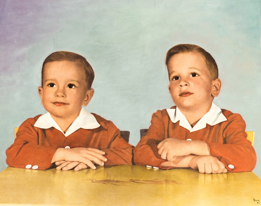 Painting of two young boys, twins. Their sweaters are orange and have white collars, and their arms are propped on a shiny wooden table.